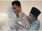 ramli-dan-istri-yang-histeris-dirinya-dinyatakan-batal_20170728_212155.jpg