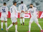 raphael-varane-dan-karim-benzema.jpg