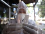 rapid-test-antigen-di-terminal-kampung-rambutan_20201225_215910.jpg