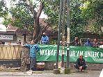 ratusan-orang-menduduki-rumah-di-jl-kebangkitan-nasional.jpg