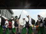 ratusan-santri-ponpes-sidogiri-pulang-dan-disterilisasi_20200402_201145.jpg