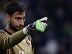 reaksi-kiper-ac-milan-gianluigi-donnarumma_20180223_110530.jpg