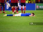 reaksi-penyerang-italia-federico-chiesa-pada-akhir-pertandingan-sepak-bola.jpg