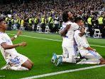 real-madrid-brasil-casemiro-kanan-merayakan-dengan-rekan-setimnya.jpg