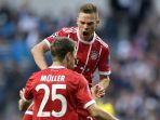 real-madrid-vs-bayern-muenchen-joshua-kimmich-dan-thomas-muller-3_20180502_031731.jpg