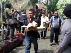 rekonstruksi-pembunuhan-satu-keluarga_1_20170508_112024.jpg