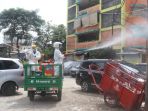 relawan-pmi-lakukan-penyemprotan-disinfektan-di-rusun_20200404_160303.jpg