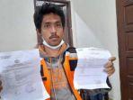 reza-nauli-lubis-petugas-e-parkir-yang-dikejar-oleh-preman-di-jalan-pandu-kecamatan-medan-kota.jpg