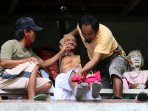 ritual-adat-manene-dan-manene-tahu-tahu-tradisi-toraja-utara_20150817_165615.jpg