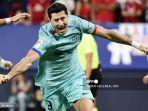 robert-lewandowski-berselebrasi-merayakan-gol.jpg