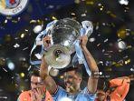rodri-angkat-piala-champions.jpg
