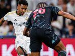 rodrygo-real-madrid-saat-dihadang-oleh-manuel-akanji-manchester-city-di-liga-champions.jpg