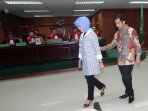 romi-herton-dan-masyito-divonis-bersalah-suap-pilkada-palembang_20150309_190126.jpg