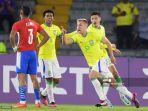ronald-brasil-merayakan-setelah-mencetak-gol-melawan-paraguay.jpg