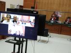 roy-suryo-jalani-sidang-perdana_20221012_161303.jpg