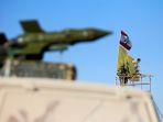rudal-hizbullah-dengan-latar-belakang-bendera-lebanon.jpg