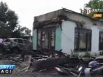 rumah-dan-mobil-aktivis-antikorupsi-dibakar_20170207_141439.jpg