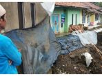 rumah-warga-kena-longsor_20180203_125813.jpg