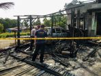 rumah-wartawan-serambi-indonesia-dibakar_20190731_220317.jpg