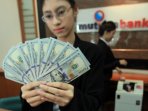 rupiah-kembali-melemah_20150729_050055.jpg