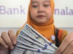 rupiah-menguat-di-level-rp-15000-per-dollar_20230728_001604.jpg