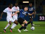 ruslan-malinovskiy-kanan-bekerja-di-sekitar-gelandang-pantai-gading-ac-milan-franck-kessie.jpg