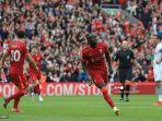 sadio-mane-tengah-merayakan-gol-keduanya.jpg