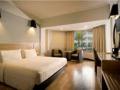 salah-satu-kamar-di-hotel-santika-premiere-jogja.jpg