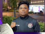 samuel-marbun-dari-cabor-wushu-nomor-mens-sanda-65-kg.jpg