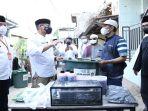 sandiaga-uno-bersama-rumah-siap-kerja-dan-rumah-sandi-uno-indonesia-menyambangi-gang-ayub.jpg