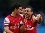 santi-cazorla-bersama-mikel-arteta-saat-bela-arsenal.jpg