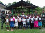 satgas-pamtas-yonif-pr-328dgh-ramaikan-kegiatan-sekolah-minggu_20190408_113530.jpg