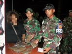 satgas-pamtas-yonif-pr-328dgh-tangkap-wanita-bawa-ganja_20181217_091652.jpg