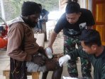 satgas-yonif-raider-509kostrad-adakan-pengobatan-gratis-di-papu_20160616_164756.jpg
