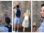 screenshot-video-turis-coret-coret-dinding-colosseum-italia.jpg