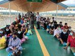 sebanyak-135-pekerja-migran-indonesia-pmi-bermasalah-dideportasi.jpg
