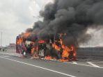 sebuah-bus-akap-terbakar-saat-melintas-tol-dalam-kota-arah-tanjung-priok-kilometer.jpg