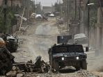 sebuah-kendaraan-tempur-pasukan-irak-di-sisi-barat-kota-mosul_20170516_185446.jpg