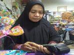 sejak-menjadi-agenbrilink-endang-mengajak-warga-sekitaruntuk-ikut-menggunakan-bri.jpg