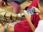 tribunnews/sejumlah-anak-sedang-bermain-gawai_20230516_093907.jpg