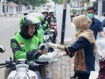 sekretariat-presiden-setpres-membagikan-paket-nasi-box.jpg