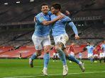 selebrasi-gol-john-stones-bersama-ruben-diaz-dalam-laga-melawan-manchester-united.jpg