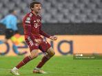 selebrasi-gol-thomas-muller.jpg