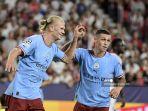 selebrasi-haaland-dengan-foden.jpg