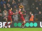 selebrasi-jordan-henderson-seusai-mencetak-gol.jpg