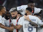 selebrasi-olivier-giroud-pada-laga-as-roma-vs-ac-milan-liga-italia.jpg