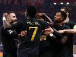 selebrasi-para-pemain-real-madrid-setelah-brahim-diaz-cetak-gol-ke-gawang-leipzig.jpg