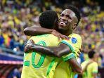 selebrasi-vinicius-junior-dan-savinho-di-copa-america-2024-lawan-paraguay.jpg