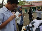 selesai-un-smk-yplp-pgri-1-makassar-kumpulkan-seragam_20150417_125718.jpg