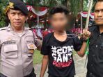 seorang-pemuda-pakai-kaos-2019gantipresiden_20181007_153046.jpg